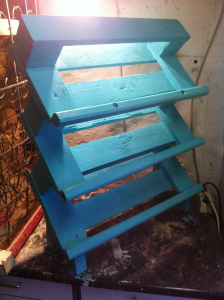 Shoe rack made of pallets: front view, painted 