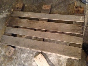 Pallet material for a tea light candle holder