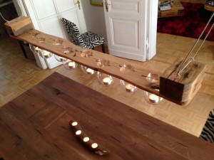 Hanging pallet candle holder, lit from above