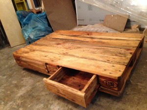 Coffee table, varnished, open drawer