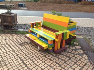 Large pallet chair, coloured and with extendable footrests